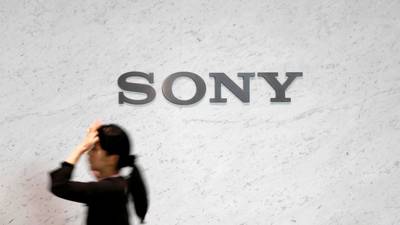 Sony cuts annual profit forecast by 10% as it focuses business