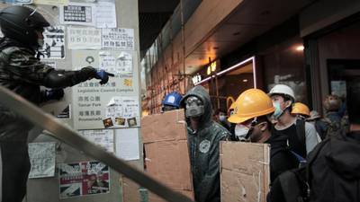 Hong Kong protesters force temporary closure of government