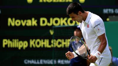 Straight sets victory for Novak Djokovic as he eases into Wimbledon