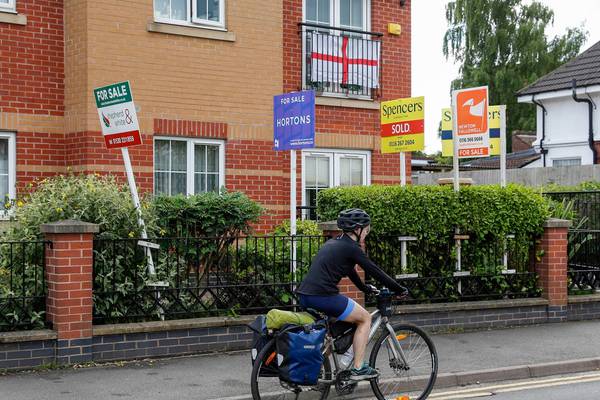 UK housing boom cools as prices fall in June - Halifax
