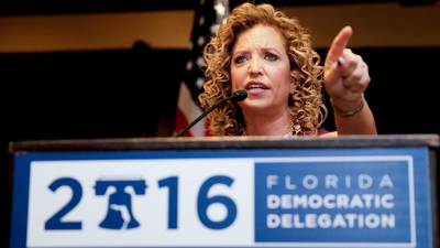 Democratic convention begins in chaos as departing boss jeered