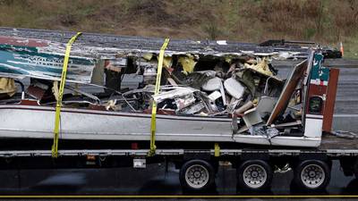 US train crash investigators look at whether driver was distracted