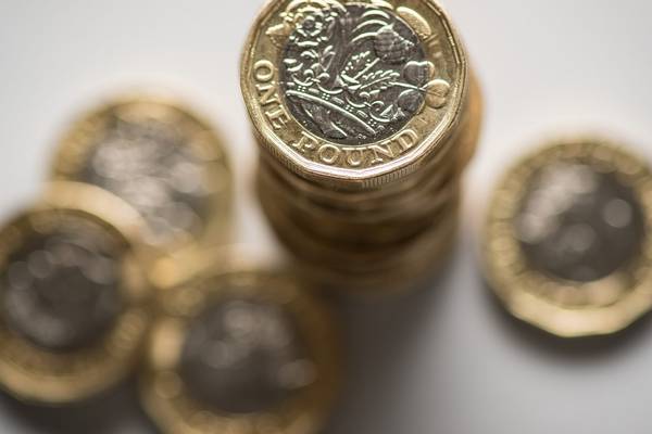Pound sinks after British PM warns Brexit talks at impasse