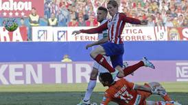 Torres nets again as Atletico increase pressure on Barcelona