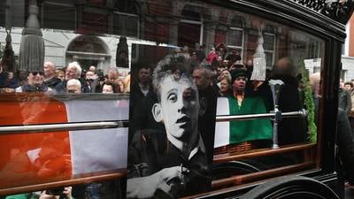 Crowds line Dublin streets to cheer, sing and bid farewell to ‘huge legend’ Shane MacGowan 
