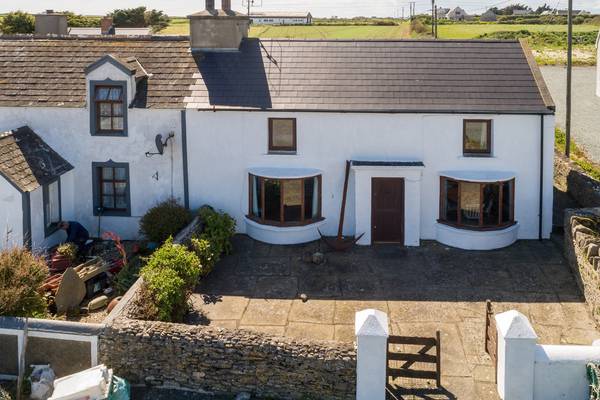 Hang out on the harbour in Slade for €230k