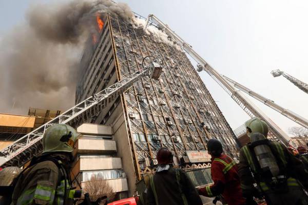 At least 20 firefighters killed as landmark Tehran building collapses