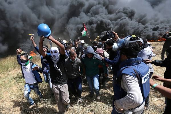 Palestinian journalist killed as Israel-Gaza protest death toll rises