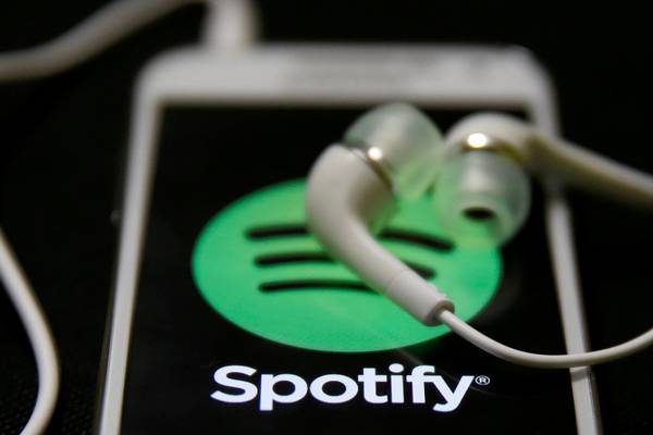 Spotify shares jump 26% in early trading on Wall Street