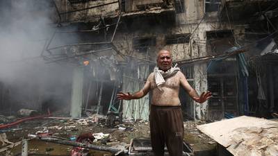Suicide bombings in Baghdad and nearby town kill 31