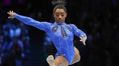 Simone Biles extends streak as most decorated gymnast with sixth all-round world title 