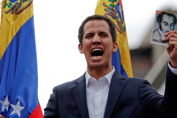 Venezuela’s opposition leader urges military to abandon Maduro