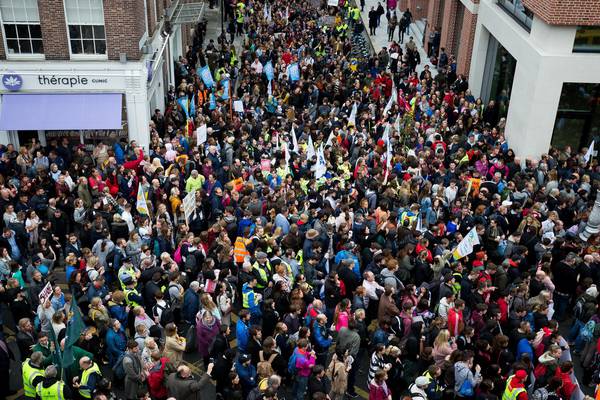 Up to 10,000 attend rally demanding end to housing crisis