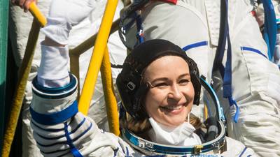 Russian crew reaches International Space Station to make first film in space