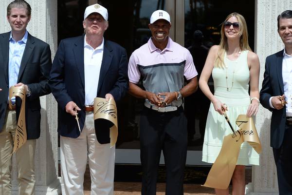 Tiger Woods changes his tune by joining in Trump’s odious game