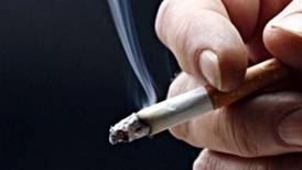 Legal threat will not halt tobacco packaging plan, says Reilly