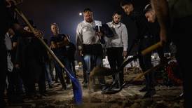 A tale of two cemeteries: Israelis and Gazans bury their dead