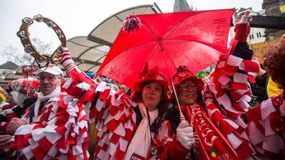 Women in Cologne celebrate carnival with fear and defiance