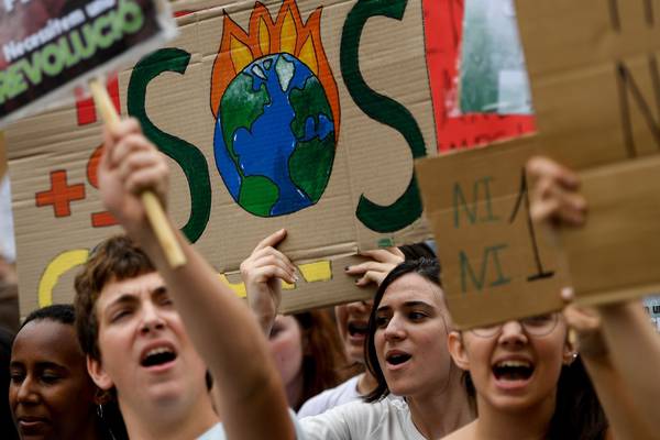 Thousands of young people worldwide take to streets in climate protest