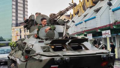 Tanks on city streets in Myanmar as mass protests continue