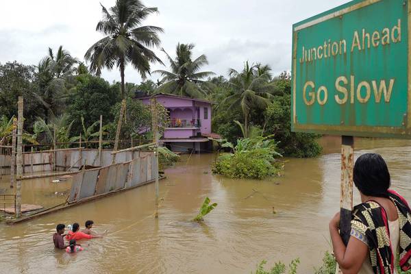More than 170 dead as monsoon floods hit India
