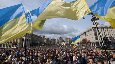 Ukrainians march against president’s peace plan with Russia