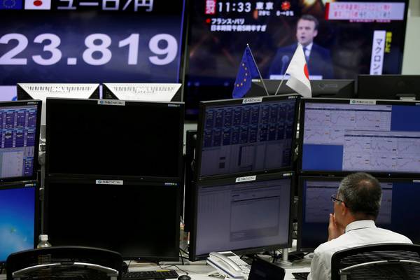 Euro hits 6-month high and Asian shares gain after French election
