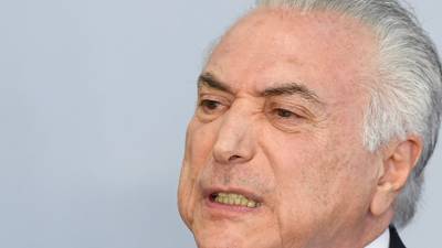 Brazil’s president criticises prosecutors over corruption charge