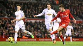 Lallana’s two goals help Liverpool sink Swansea