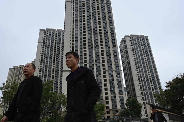 Debt-ridden Evergrande resumes work on more than 10 property projects