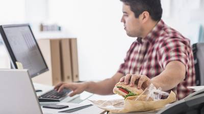 Why eating at your desk is a health risk