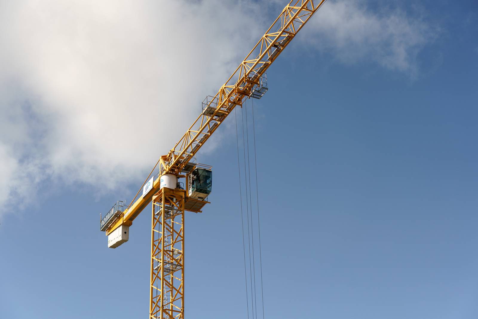 A crane at a residential construction site in Sandyford, south Dublin, Ireland, on Tuesday, May 11, 2021. The mass purchase of affordable houses  on the market for about 400,000 euros ($490,000)  set off a public firestorm and highlights the growing tension over the squeeze in urban housing and the role of large investors. Photographer: Paulo Nunes dos Santos/Bloomberg