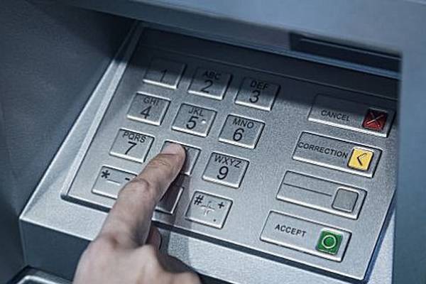 Two appear in court over alleged ATM skimming