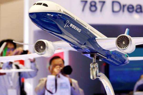 Boeing profit tops estimates