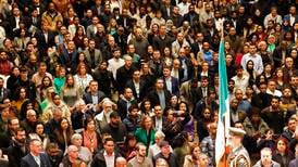 ‘I love Guinness, and I love how green the country is’: New Irish citizens conferred in Dublin