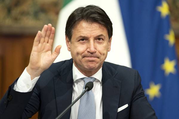 Italy’s prime minister resigns in political gamble