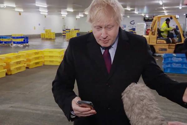 Johnson pockets reporter’s phone to avoid seeing photo of sick child
