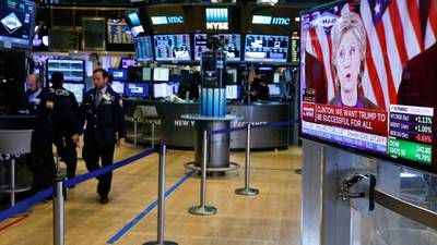 Investors brace for volatile markets after Trump’s shock win