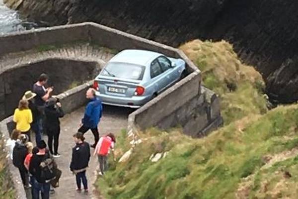 Ewe turn: Motorist gets stuck on ‘Sheep Highway’ at Kerry pier