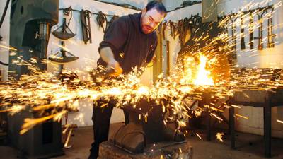 Blacksmith forges art with sparks of inspiration