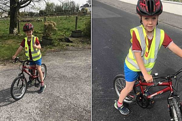 Eight-year-old boy’s pedal power raises cash for health workers