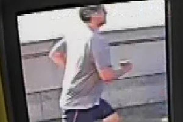 Police search for jogger who knocked woman into path of bus