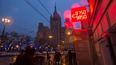 Russians try to remain stoic in face of rouble crash