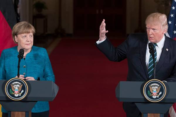 Trump stands by wiretap claims in  tense meeting with Merkel