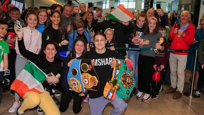 Katie Taylor arrives home after fight to displays of devotion