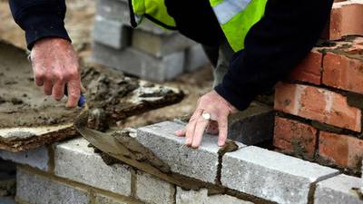 Building workers to get higher minimum pay from February