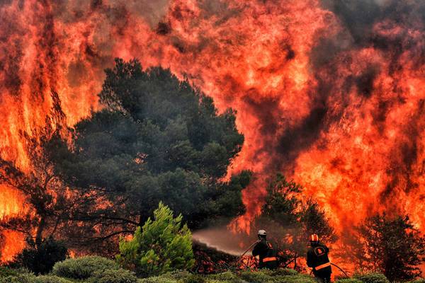 Greece wildfires: Tsipras takes responsibility amid fierce criticism