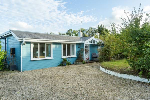 Escape to a blue beach house at Ballymoney for €250,000