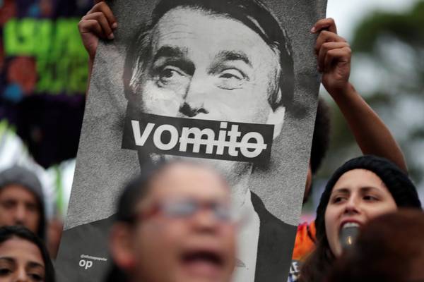 Brazilians go to polls in tense presidential race