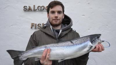 College graduate catches first salmon of 2014